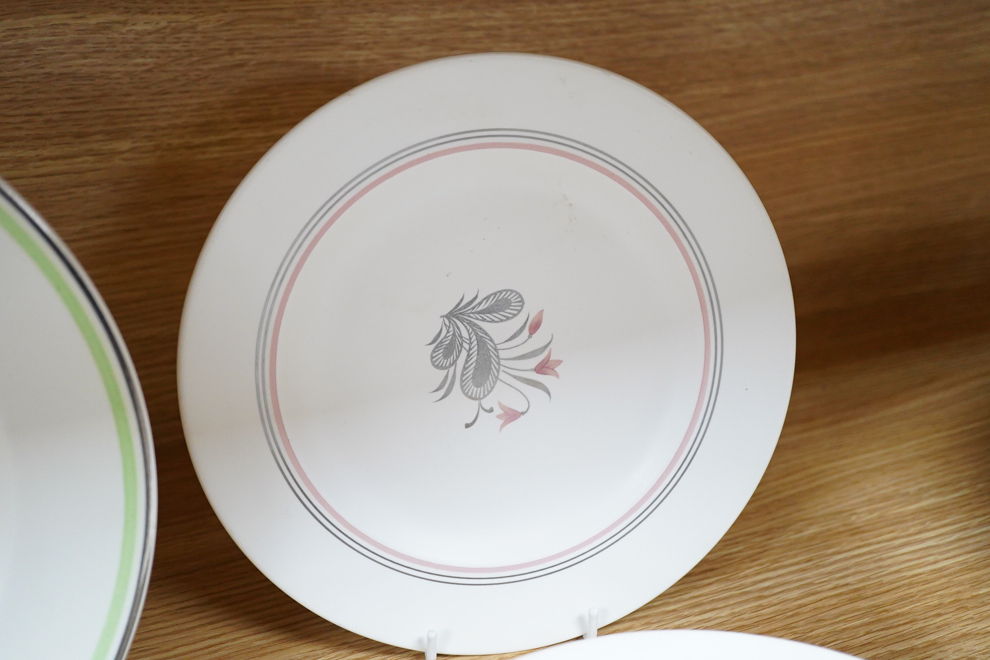Keith Murray for Wedgwood, moonstone weeping willow, two plates and eight similar examples, largest 26cm in diameter